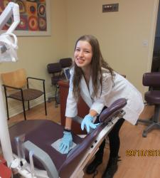 Rachel working as a Dental Ortho Hygienist for Dr. Larry Parker